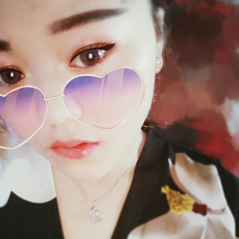 谭美